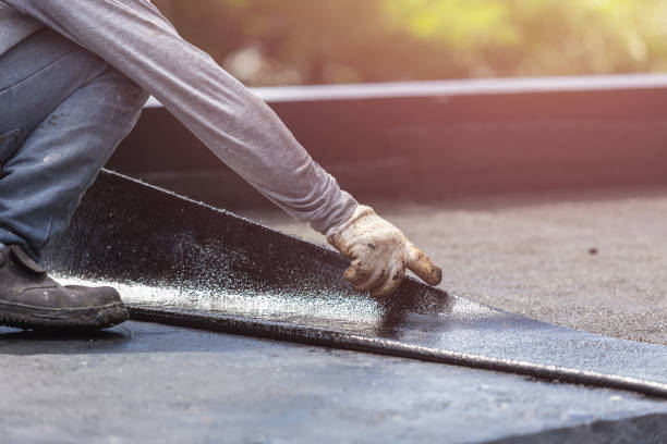 Professional Waterproofing technician working in Elora, TN